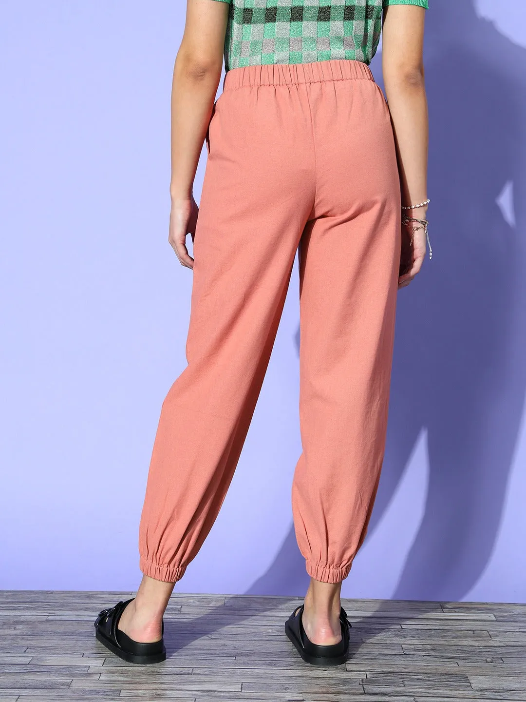 Berrylush Women Solid Pink Front Tie-Up 2-Pocket High-Rise Elastic Waist Pleated Regular Trousers